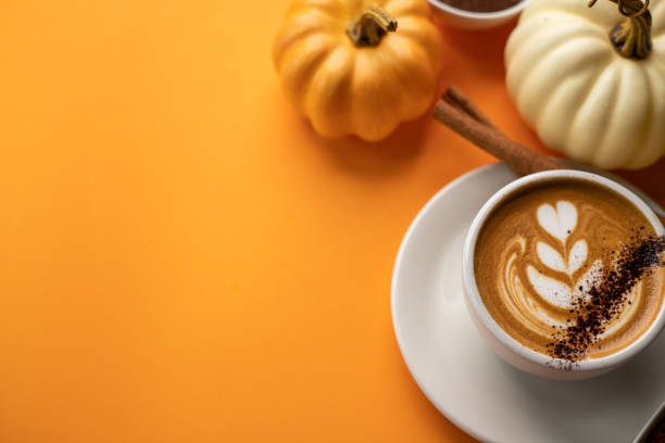 istock Pumpkin spice latte on a orange background 1277326101