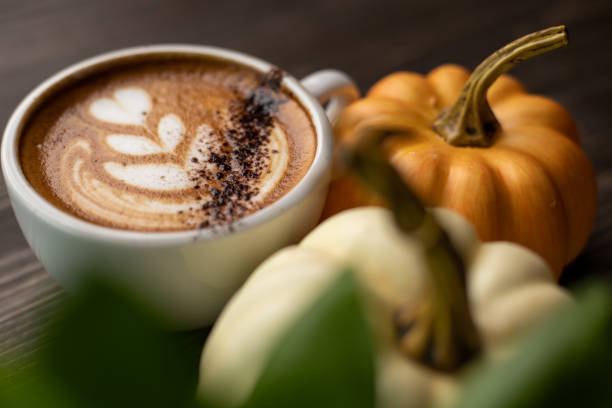 istock Pumpkin spice latte on a wooden background 1277326109