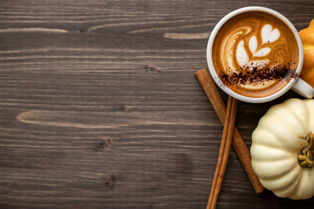 istock Pumpkin spice latte on a wooden background 1277326130
