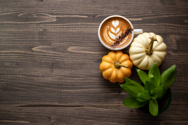 istock Pumpkin spice latte on a wooden background 1277326131