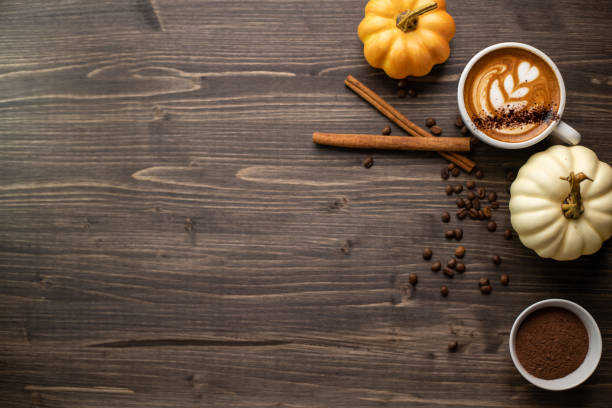 istock Pumpkin spice latte on a wooden background 1277326137