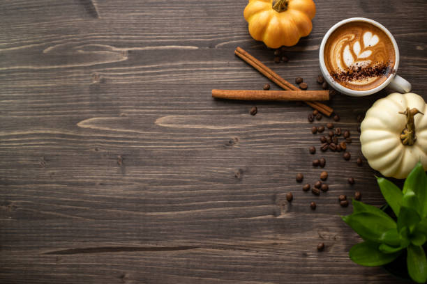 istock Pumpkin spice latte on a wooden background 1277326169
