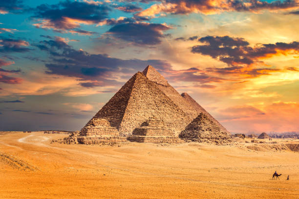 istock Egyptian pyramids at sunset 1277327835