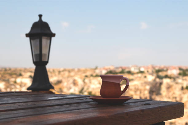 istock Turkish coffee on a table with a beautiful mountain view 1277329542
