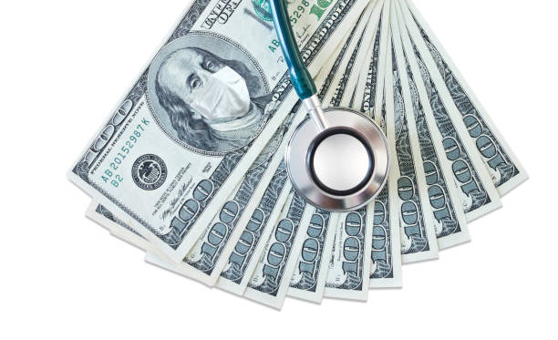 sorveglianza finanziaria pandemia di durin - currency stethoscope medicare usa foto e immagini stock