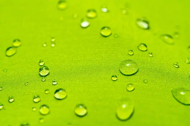 Water drops on the green waterproof fabric