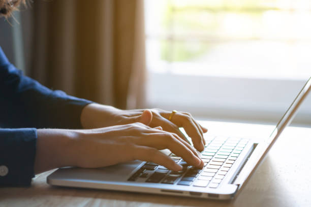 istock Working on keyboard modern laptop on top table. Business and working concept. 1277333471