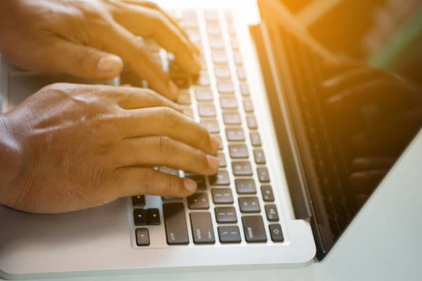 istock Working on keyboard modern laptop on top table. Business and working concept. 1277333618