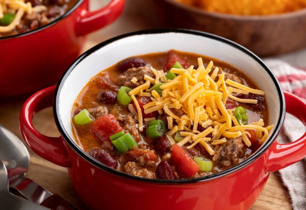 istock Bowl of chili con carne with cheddar cheese 1277334156