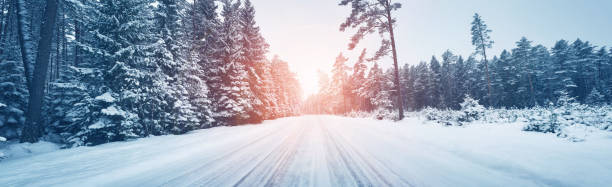 istock Winter road, covered with snow on sunny day 1277334809