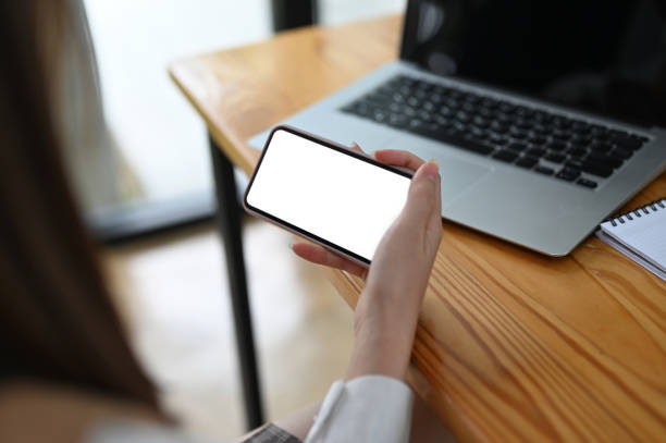 istock Cropped shot female looking with smartphone, Horizontal white screen for present. 1277334822