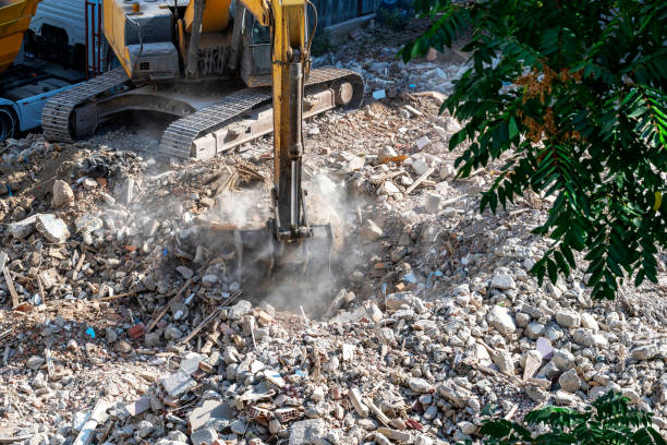 istock Yellow excavator is working on the construction site 1277334909