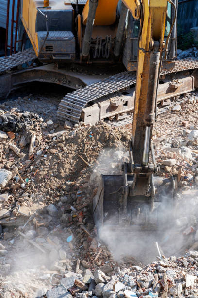 istock Yellow excavator is working on the construction site 1277334975