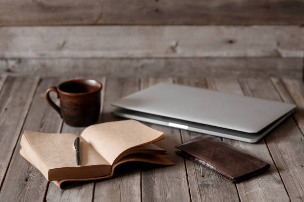 istock Office desk with blank screen smartphone,pen,notebook and coffee cup on wood table.Top view with copy space.Office supplies and gadgets on desk table.Working desk table concept.Flat lay image 1277339597
