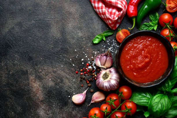 istock Homemade spicy tomato sauce with ingredients for making 1277341041