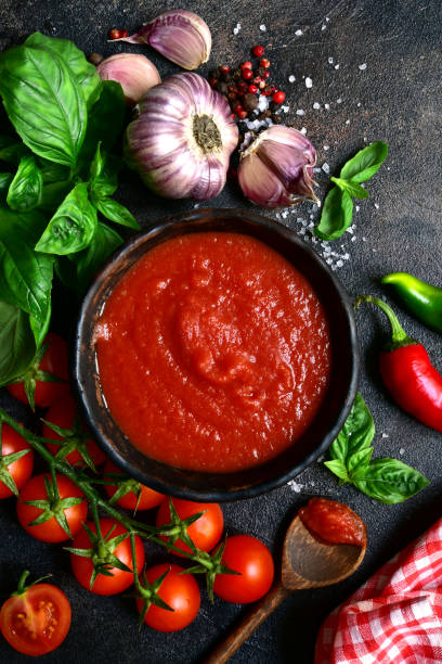 istock Homemade spicy tomato sauce with ingredients for making 1277341042
