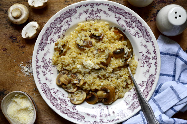 istock Risotto with mushrooms and cheese 1277342803