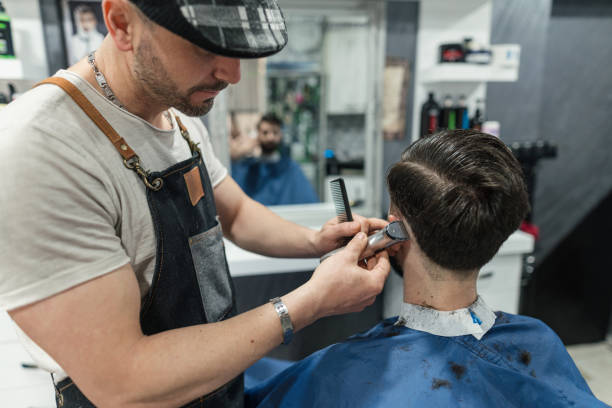 istock Barber working at the hair salon 1277343840