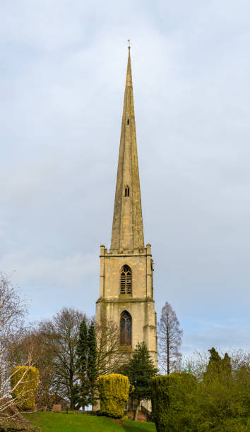 istock A tall Church Spire rises above surrounding trees 1277343857