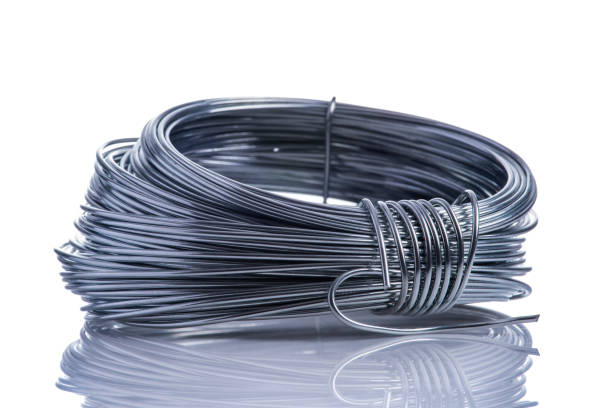 istock Coil of stainless steel wire isolated on white 1277346647