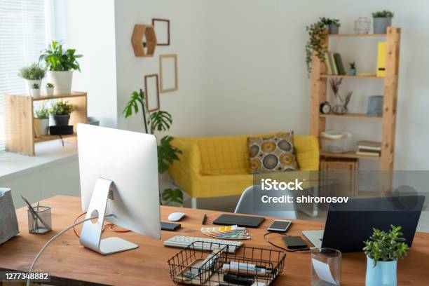 Workplace Of Contemporary Manager Or Freelancer With Computer Monitor On Table Stock Photo - Download Image Now