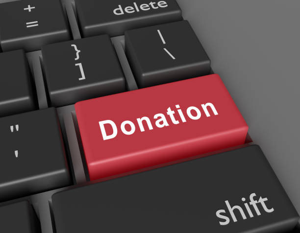 istock Donation concept. Word Donation on button of computer keyboard 1277350634