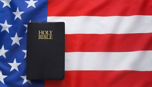istock Holy Bible And American Flag 1277351892