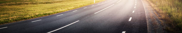 istock Asphalt road and dividing lines 1277352707