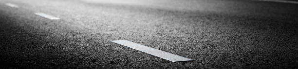 istock Asphalt road and dividing lines 1277352724