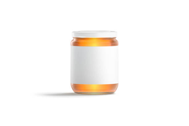 blank glass jar with white label and honey mock up - mel ilustrações imagens e fotografias de stock