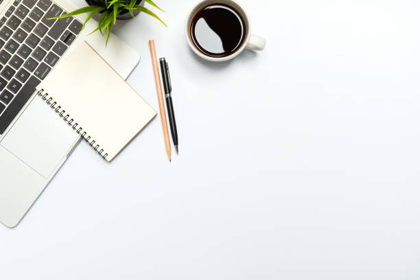 istock Flat lay of White office desk table or workplace with laptop 1277356908