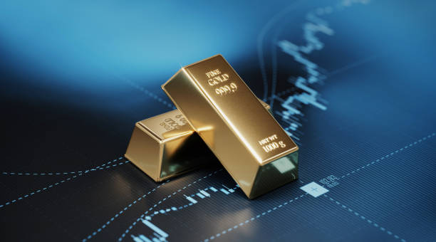 goldbarren sitzen auf blue bar graph - börsen- und finanzkonzept - goldfarbig grafiken stock-fotos und bilder