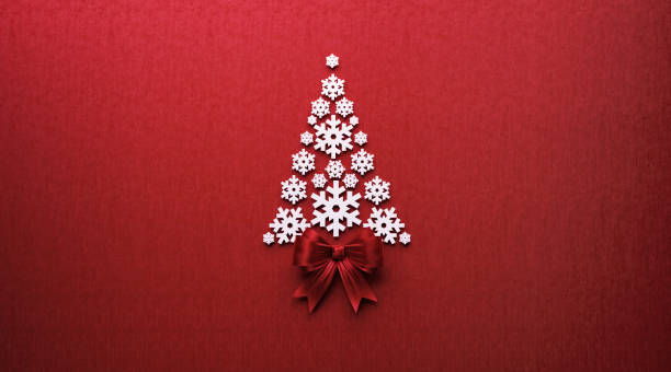 Snowflakes and Red Bow Tie Forming A Christmas Tree on Red Background