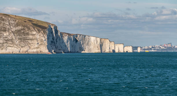 Old Harry Rocks and Jurassic Coast Old Harry Rocks and Jurassic Coast, with Bournemouth in the distance. old harry rocks stock pictures, royalty-free photos & images