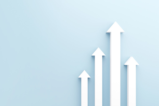 Financial Trading Concept with Green UP Arrow and a Stock Market Chart as a Background. 3D Render