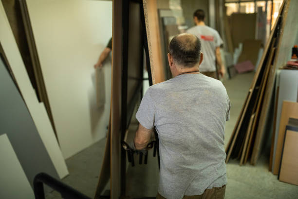 istock Colleagues doing their job in woodworking company 1277368030