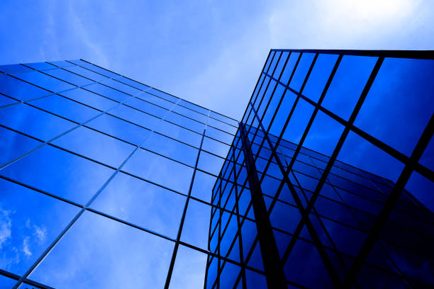 istock Business building with mirrored windows highrise financial with sky and clouds 1277370253