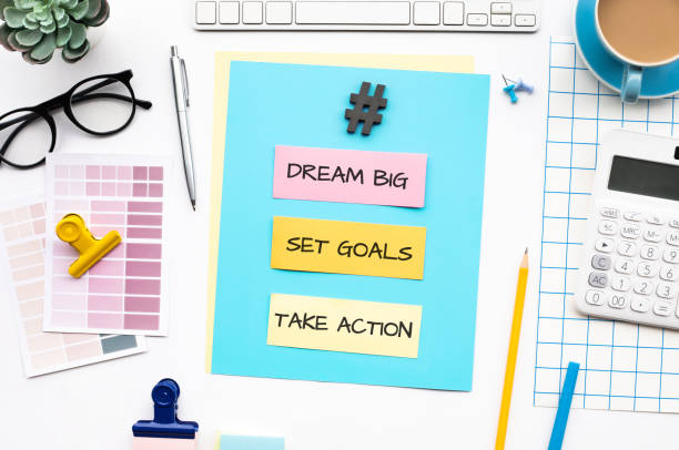 istock Dream big,set goals,take action concepts with text on desk table. 1277370779