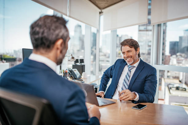 istock Decision makers having business meeting - financial experts analyzing markets after covid-19 recession 1277375525
