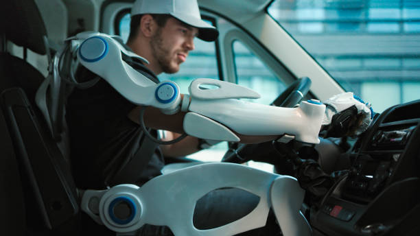 Delivery man wearing powered exoskeleton sitting in his van Delivery man using biotechnology improvment. Wearing powered exoskeleton at work indigo truck stock pictures, royalty-free photos & images