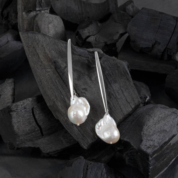 istock Silver white baroque pearl earrings 1277379146