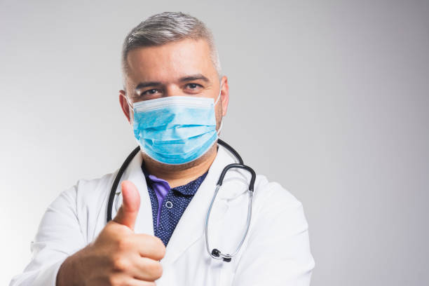 istock Male Surgeon Gesturing Thumbs Up 1277383682