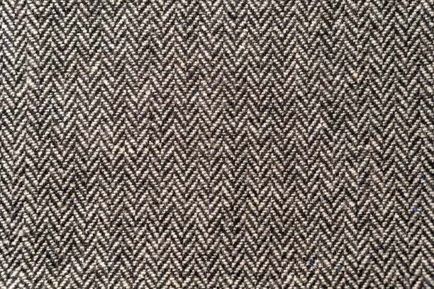 Wool fabric background. Amazing texture of warm textile for winter coats. Close-up to isolated wool fabric background. Amazing texture of warm textile for winter coats. tweed stock pictures, royalty-free photos & images