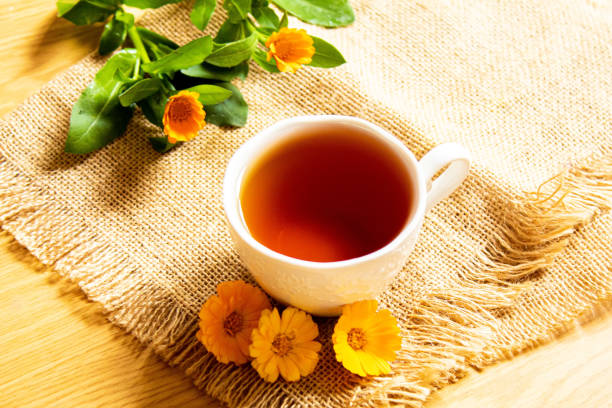 istock honey with dandelions. cup of tea with dandelion. selective focus. 1277387758