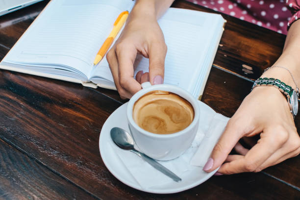 istock Woman writing her notebook stock photo 1277390688