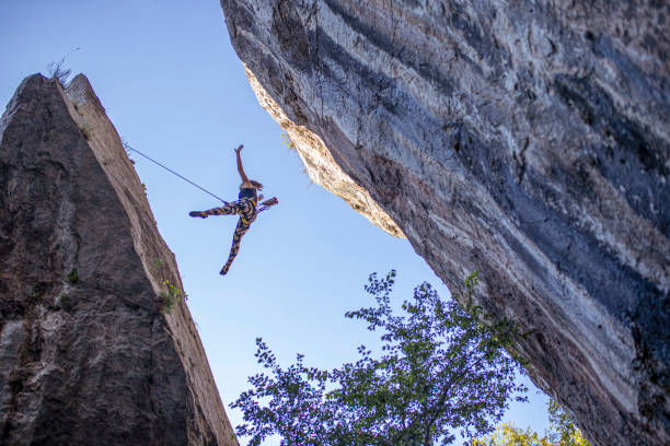 istock Woman climber on challenging route in a cave 1277391517