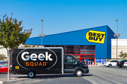 Montclair, CA / USA – September 26, 2020: A large Geek Squad van is parked at the Best Buy retail store located in Montclair, California.