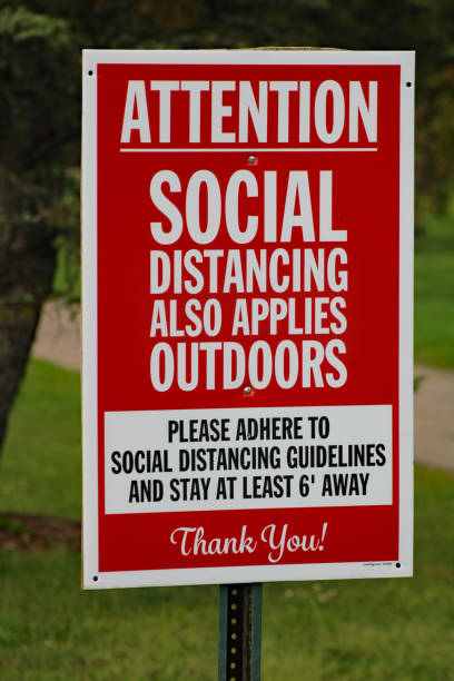 istock Michigan Social Distancing Mandate Sign 1277394500
