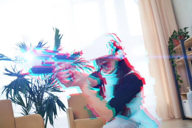 istock Woman with virtual reality headset is playing game. Image with glitch effect. 1277394928