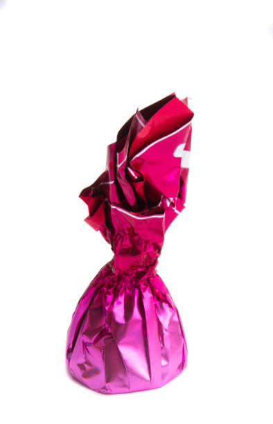 istock chocolate candies in colored wrapper isolated 1277394963